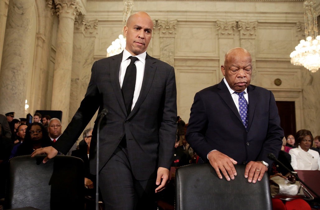 Senator Cory Booker and John Lewis take their seats before testifying against Jeff Session’s confirmation (<a href=