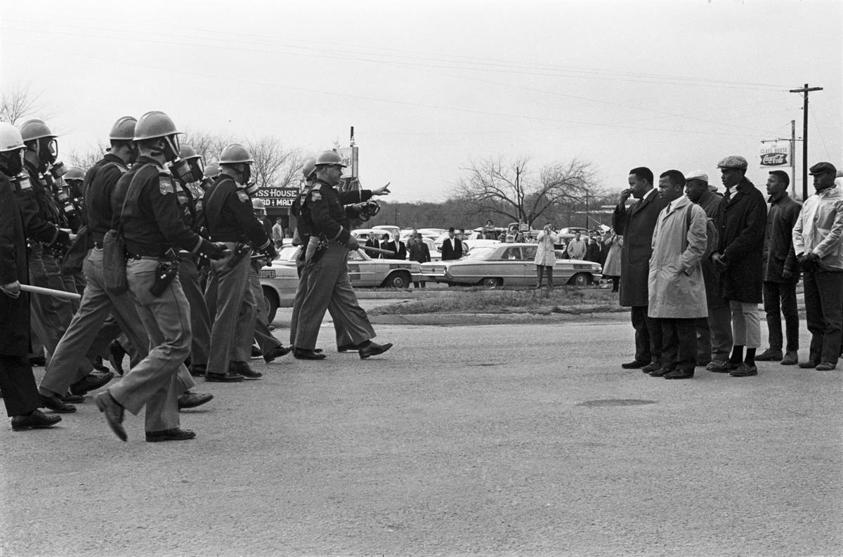 Police advance on John Lewis and fellow civil rights activists