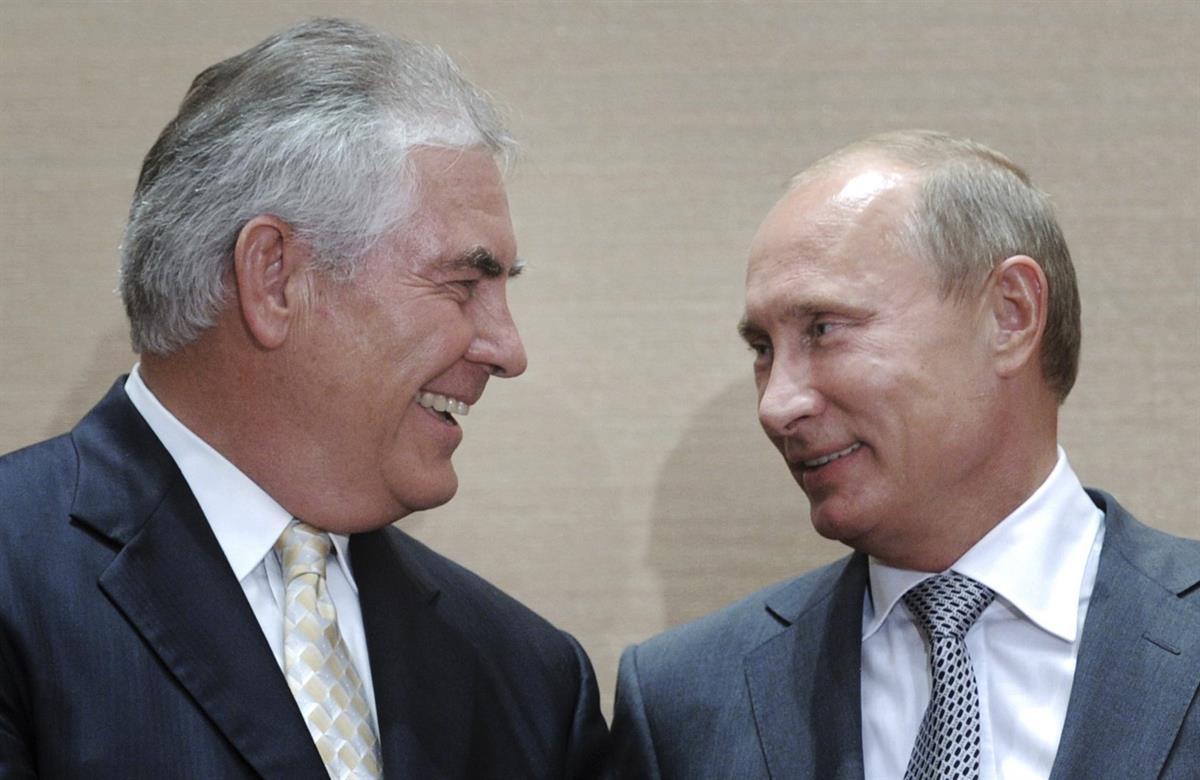 Rex Tillerson and Vladimir Putin during a signing ceremony in the Black Sea resort of Sochi, Russia, Aug. 30, 2011. (AP photo/RIA Novosti, Alexei Druzhinin, pool)