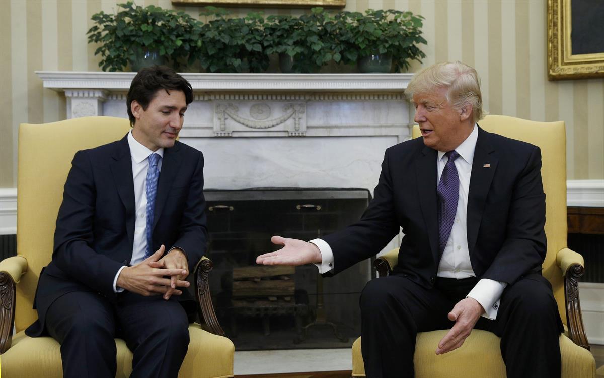 Prime Minister Justin Trudeau about to shake President Donald Trump’s Hand (Kevin Lamarque /Reuters)