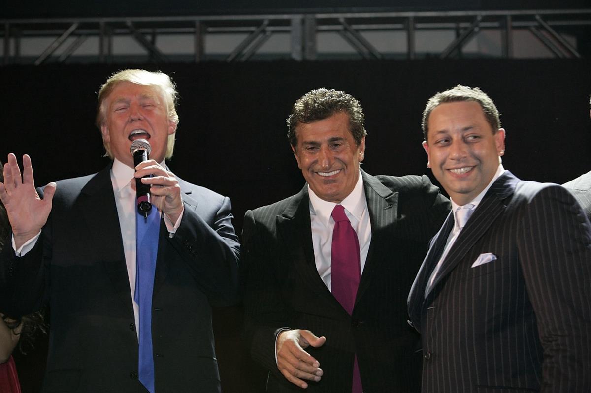 From Left: Donald Trump, Bayrock Group Chairman Tevfik, and Felix Sater at the Trump Soho launch party on Sept. 19, 2007, in New York. (Mark Von Holden/WireImage)