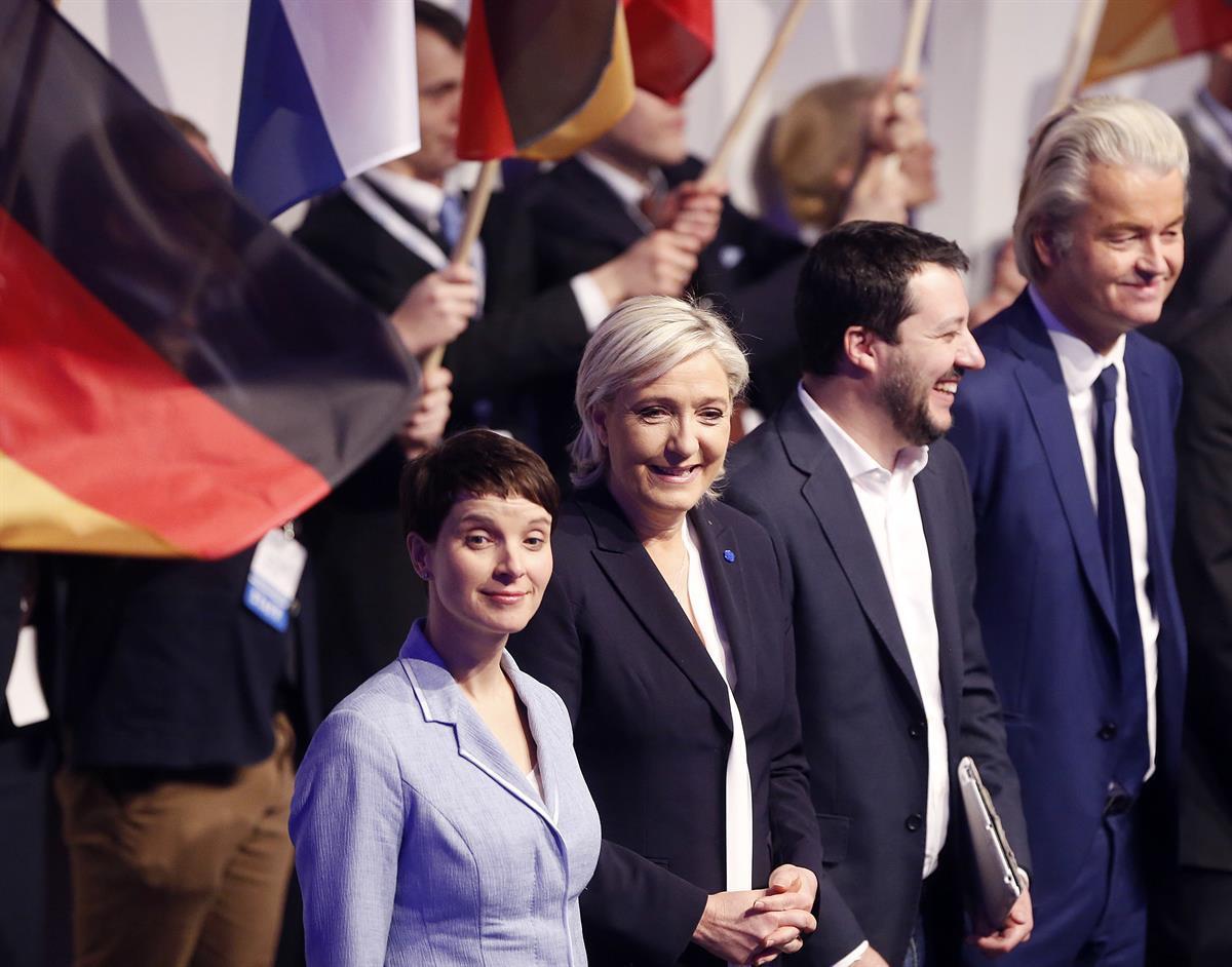 AfD (Alternative for Germany) chairwoman Frauke Petry, Far-right leader and candidate for next spring presidential elections Marine le Pen from France, Italian Lega Nord chief Matteo Salvini and Dutch populist anti-Islam lawmaker Geert Wilders , from left, stand together in the beginning of a meeting of European Nationalists in Koblenz, Germany, Saturday, Jan. 21, 2017. (AP Photo/Michael Probst)