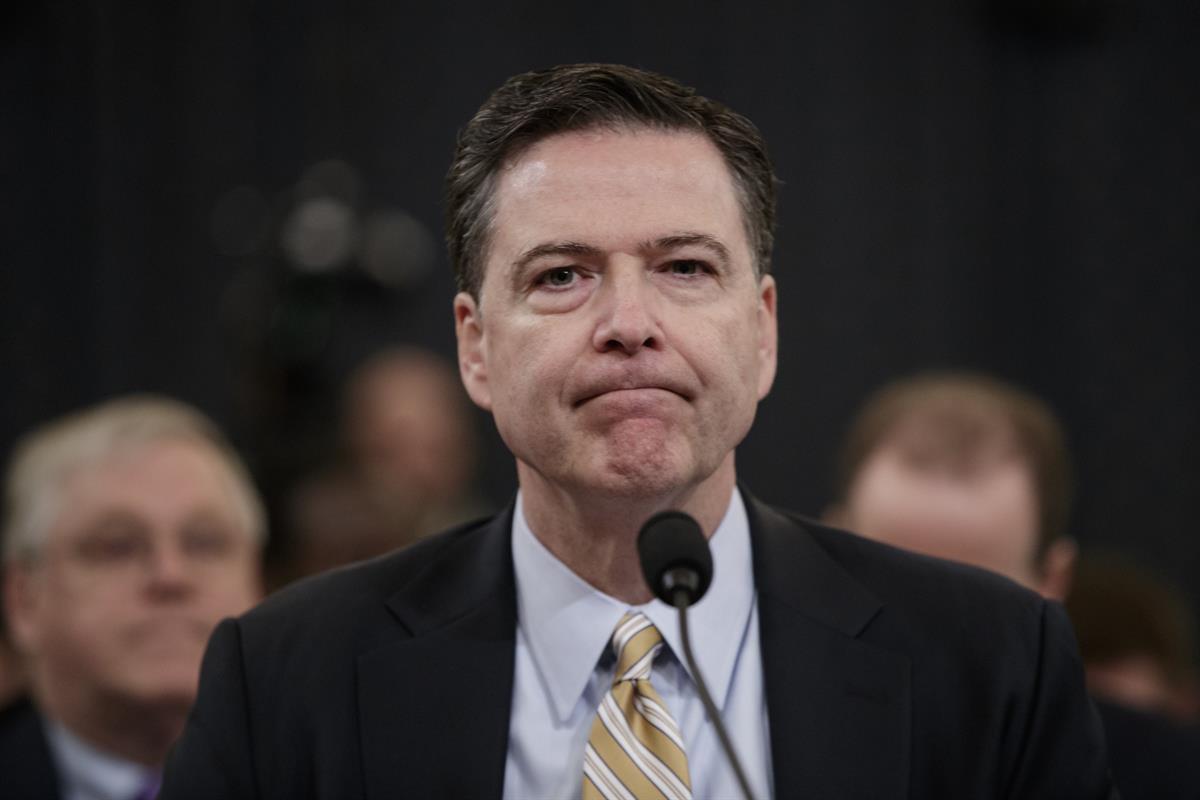 FBI Director James Comey pauses as he testifies on Capitol Hill in Washington, Monday, March 20, 2017, before the House Intelligence Committee hearing on allegations of Russian interference in the 2016 U.S. presidential election. (AP Photo/J. Scott Applewhite)