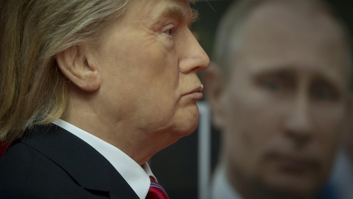 Wax model of President Donald Trump stands near a portrait of Russian President Vladimir Putin, displayed in the wax museum in Sofia, Bulgaria — Friday March 31, 2017 (AP Photo/Valentina Petrova)