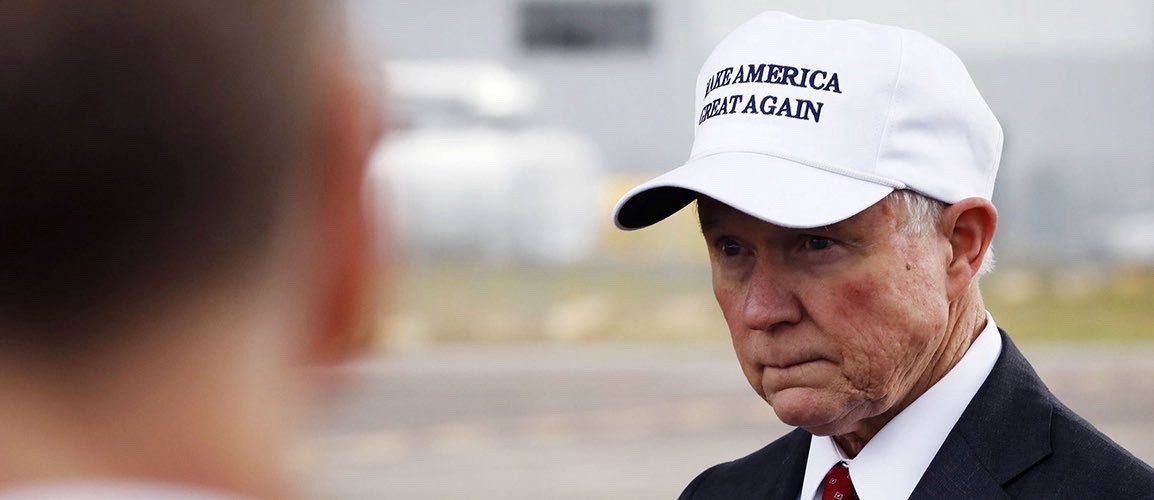 Jeff Sessions wearing a MAKE AMERICA GREAT AGAIN hat (Reuters)