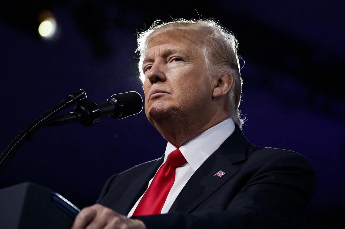 President Donald Trump pauses while speaking at the Conservative Political Action Conference (CPAC), Friday, Feb. 24, 2017, in Oxon Hill, Md. (AP Photo/Evan Vucci)