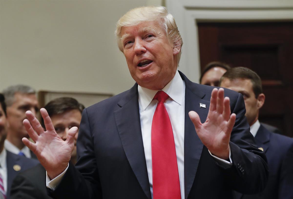President Donald Trump answers a question from a members of the the media in the Roosevelt Room of the White House in Washington — Friday, April 28, 2017 (AP Photo/Pablo Martinez Monsivais)