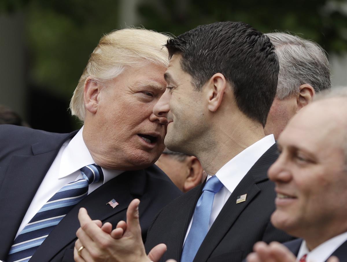 President Donald Trump with House Speaker Paul Ryan of Wis. in the Rose Garden of the White House in Washington, Thursday, May 4, 2017, after the House pushed through a health care bill (AP Photo/Evan Vucci)