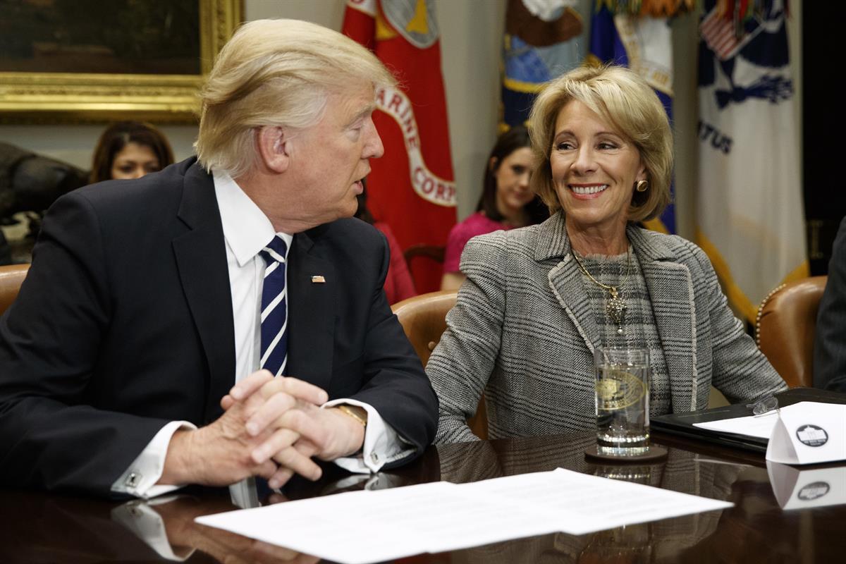 President Donald Trump and Education Secretary Betsy DeVos in the Roosevelt Room of the White House — Tuesday, Feb. 14, 2017 (AP)