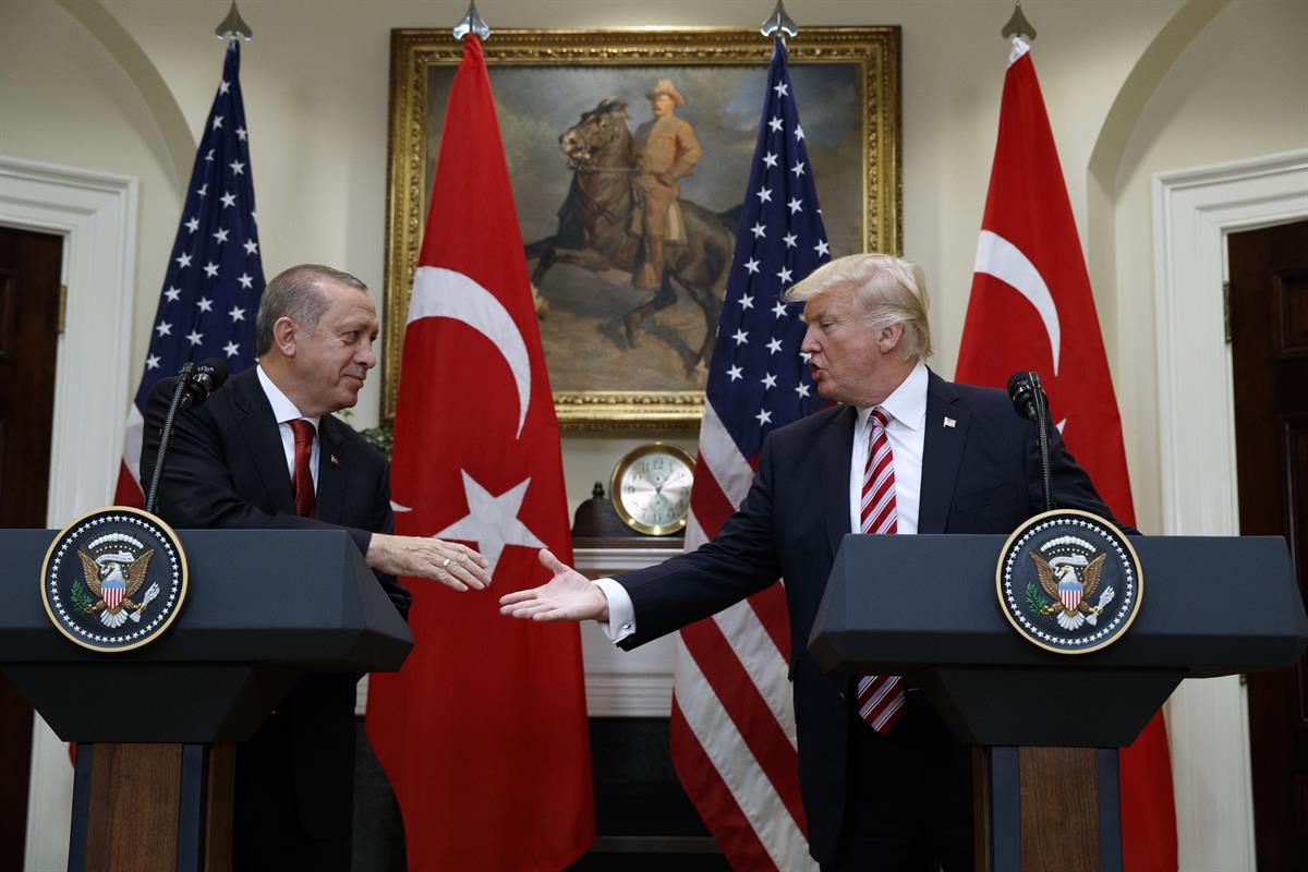 President Donald Trump shakes hands with Turkish President Recep Tayyip Erdogan in the Roosevelt Room of the White House, Tuesday, May 16, 2017, in Washington. (AP Photo/Evan Vucci)