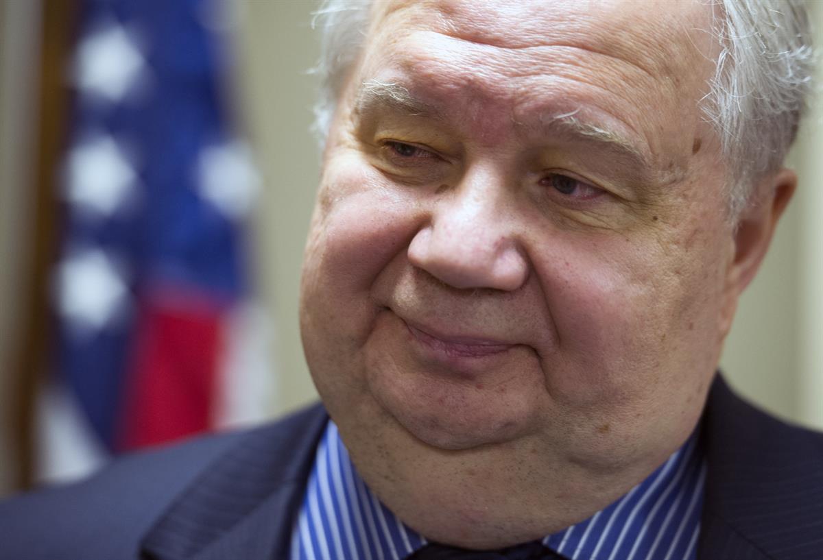 Sergey Kislyak, Russia’s ambassador to the US speaks with reporters following his address on the Syrian situation, Friday, Sept. 6, 2013 in Washington. (AP Photo/Cliff Owen)