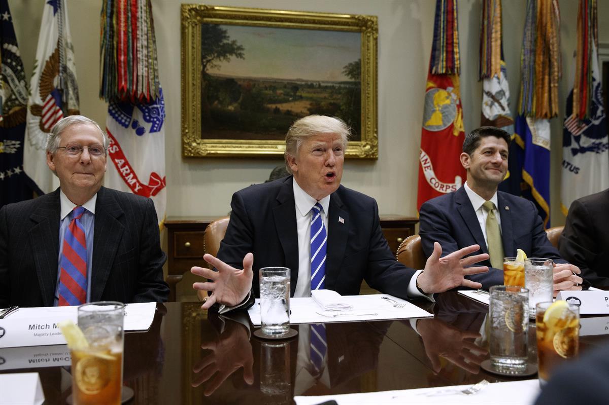 President Donald Trump, Senate Majority Leader Mitch McConnell (left), and House Speaker Paul Ryan (right) (AP/Evan Vucci)