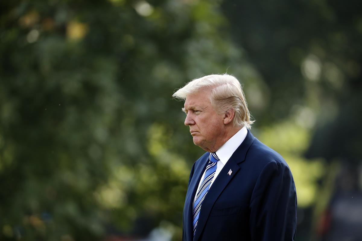 President Donald Trump walks to Marine One on the South Lawn of the White House — Thursday, Aug. 3, 2017, in Washington (AP Photo/Alex Brandon)