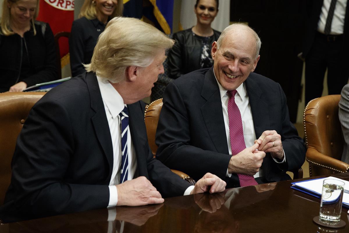President Donald Trump talks with then-Homeland Security Secretary John Kelly during a meeting on cyber security in the Roosevelt Room of the White House — Jan. 31, 2017 (AP Photo/Evan Vucci)