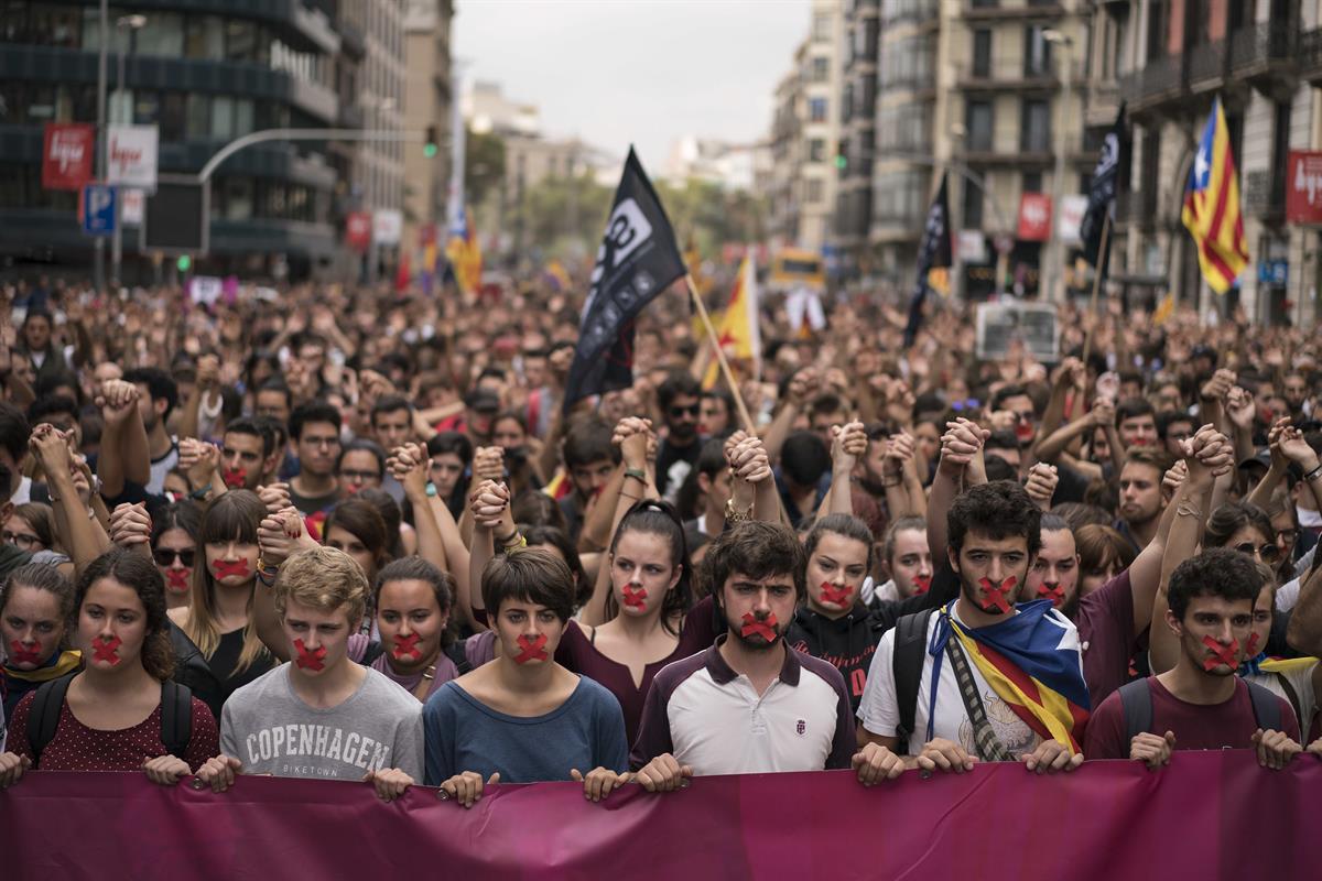 Independence supporters march during a demonstration in downtown Barcelona, Spain, Monday, Oct. 2, 2017 — (AP Photo/Felipe Dana)