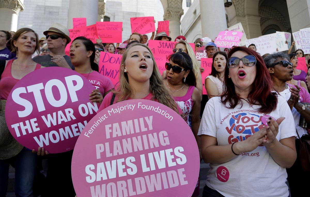 Planned Parenthood supporters rally for women’s access to reproductive health care on “National Pink Out Day’’ at Los Angeles City Hall?—?Sept. 9, 2015 (AP/Nick Ut, File)