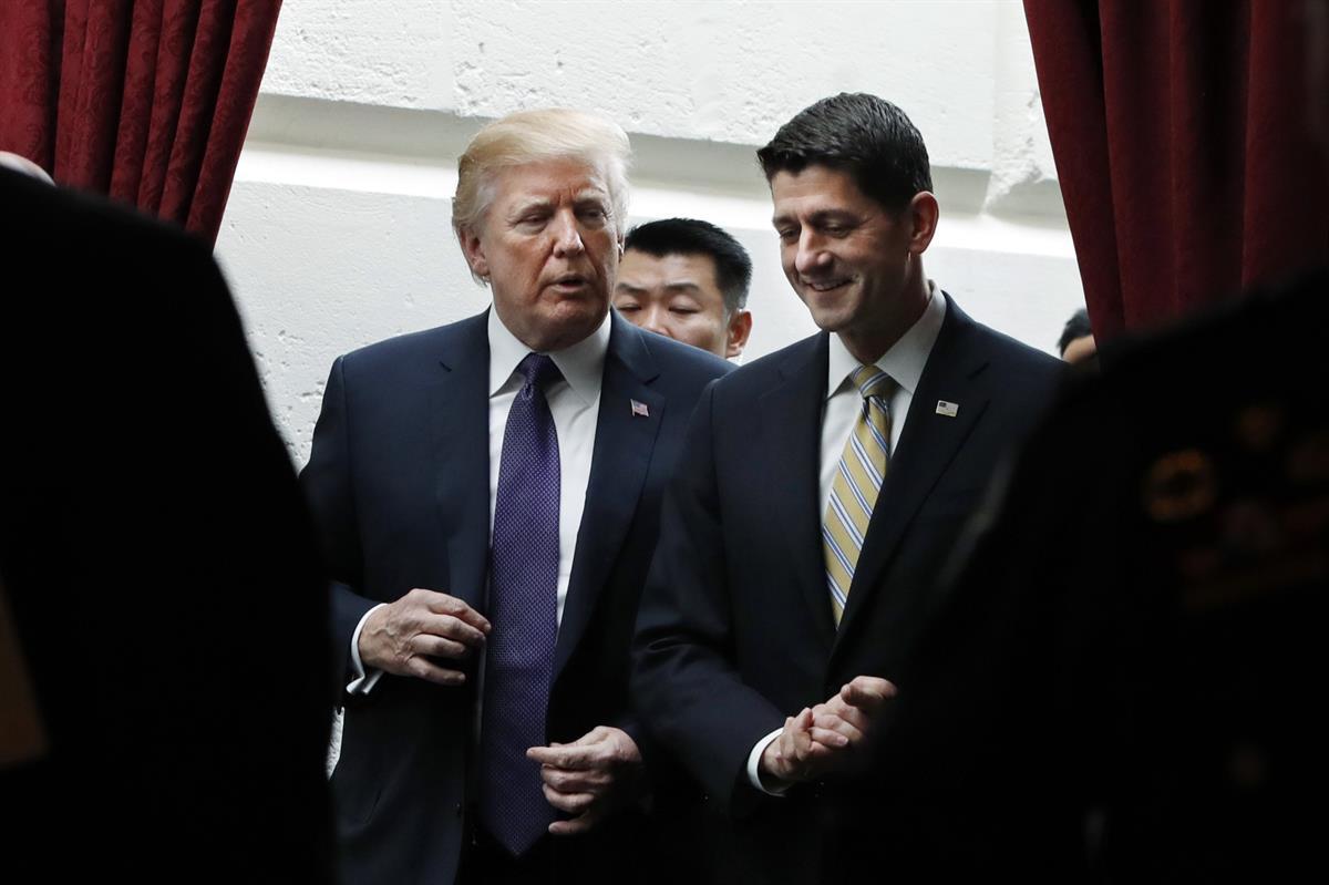 President Donald Trump, left, walks with House Speaker Paul Ryan of Wis., Thursday, Nov. 16, 2017, as they leave a meeting with House Republicans on Capitol Hill in Washington (AP Photo/Jacquelyn Martin)