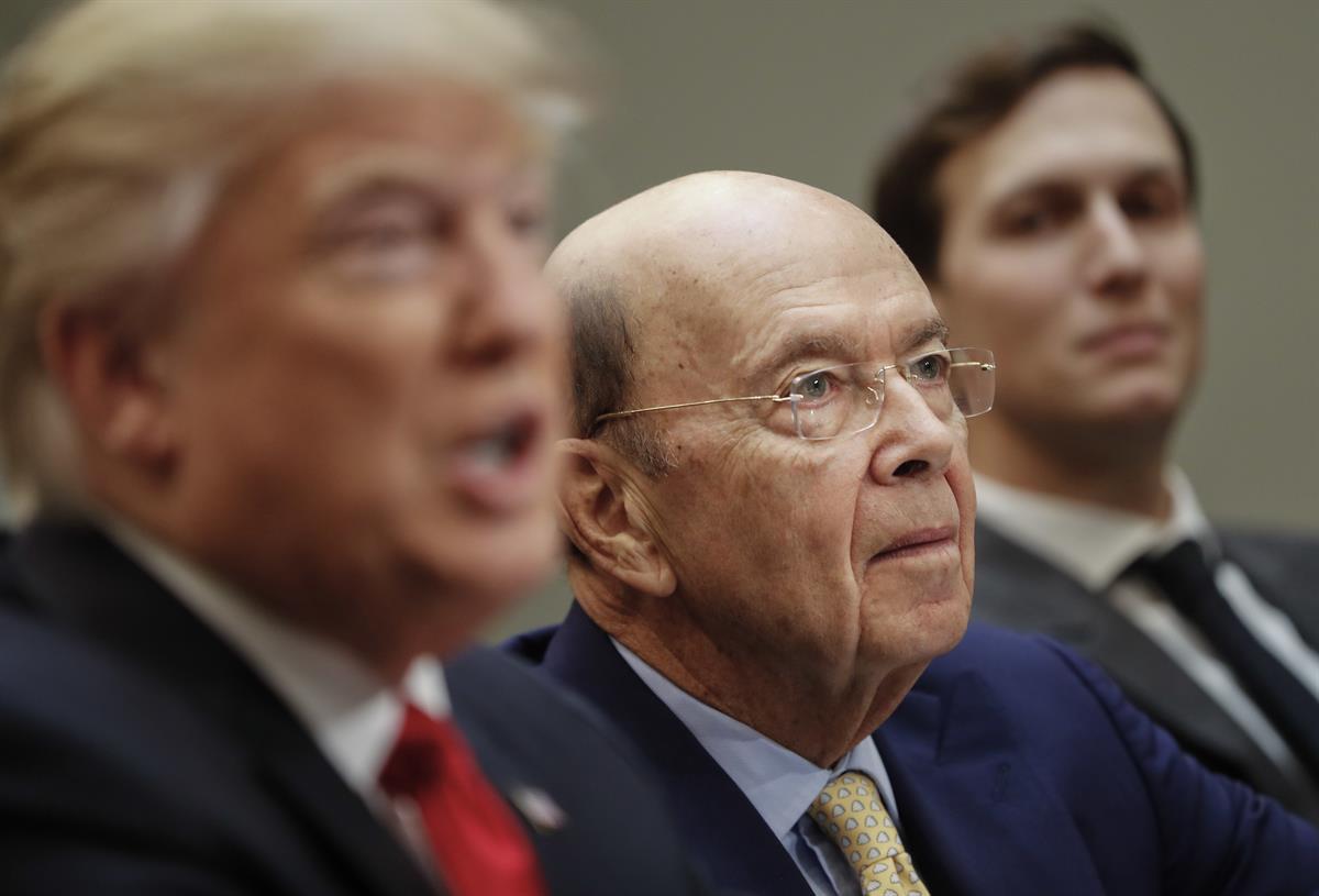 Commerce Secretary Wilbur Ross, center, listens to President Donald Trump during a meeting with House and Senate legislators in the Roosevelt Room of the White House in Washington, Thursday, Feb. 2, 2017. At right is White House Senior Adviser Jared Kushner. (AP Photo/Pablo Martinez Monsivais)