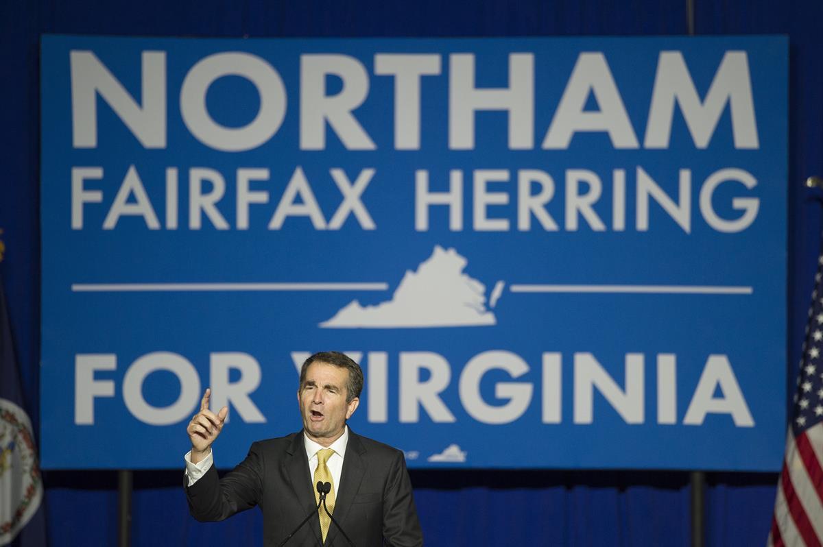 Virginia Democratic Gov. elect Ralph Northam addresses supporters and at the Northam For Governor election night party at George Mason University in Fairfax, Va., Tuesday, Nov. 7, 2017. Northam defeated Republican Ed Gillespie. (AP Photo/Cliff Owen)