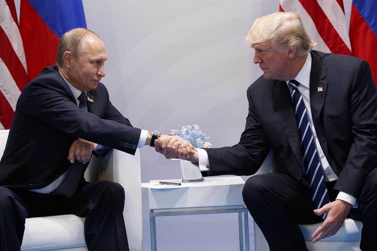 President Donald Trump shakes hands with Russian President Vladimir Putin at the G20 Summit — Friday, July 7, 2017, in Hamburg. (AP/Evan Vucci)