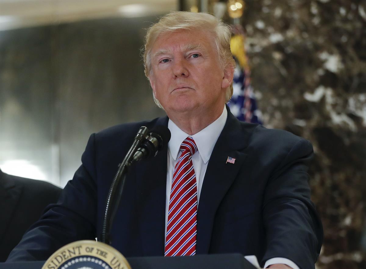 President Donald Trump listens to reporters questions in the lobby of Trump Tower, Tuesday, Aug. 15, 2017 in New York. (AP/Pablo Martinez Monsivais)