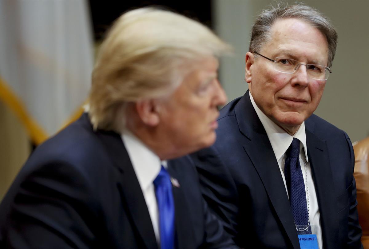 National Rifle Associations (NRA) Executive Vice President and Chief Executive Officer Wayne LaPierre listens at right as President Donald Trump speaks in the Roosevelt Room of the White House in Washington — Feb. 1, 2017 (AP Photo/Pablo Martinez Monsivais)